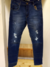 Jeans azul con roturas 750