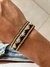 Pulsera india dorada, blanca y negra