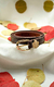 cinto-marrom-detalhe-em-flor