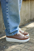 Zapatilla tachas