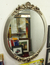Espelho com Moldura Oval.