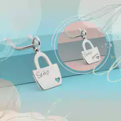 DIJE CARTERA SEÑO