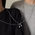 Collar Astronautas Imán - comprar online
