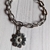 Pulsera acero con dije flor - comprar online