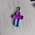 Dije cruz cristal violeta/celeste (2,5 cm)