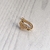 Cuff solitario acero dorado corazon con cubic - comprar online