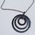 Collar (44 cm) con dije circulos (4,5 cm)