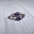 Anillo acero con piedras violetas 20