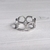 Anillo acero circulos calados 18
