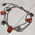 Pulsera Acero Flores Caladas Y Cristal Rojo 19 Cm - comprar online