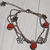 Pulsera Acero Flores Caladas Y Cristal Rojo 19 Cm