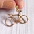 Dije acero dorado bicicleta (2 x 3 cm)