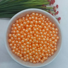https://www.aviamentosnj.com.br/produtos/perola-inteira-com-furo-passante-pacote-com-500gramas-temos-varias-cores-laranja-claro/