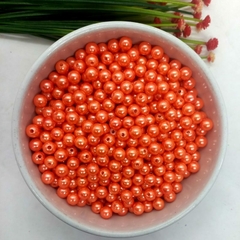 https://www.aviamentosnj.com.br/produtos/perola-inteira-com-furo-passante-pacote-com-500gramas-temos-varias-cores-laranja-escuro/