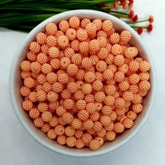 https://www.aviamentosnj.com.br/produtos/perola-craquelada-com-furo-passante-tamanho-10mm-em-abs-com-500-gramas-laranja-claro/