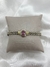 Pulsera con piedra rosa