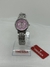 Reloj Tressa con fondo rosa