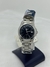 Reloj Casio pequeño con fondo negro
