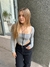 Remera corset con cierre.