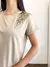 Remera Plumas Gold - comprar online