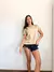 Remera Plumas Gold - scmayorista