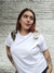 Remera Plumas Gold en internet