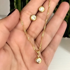 CONJUNTO PEDRA CRISTAL REDONDA BANHADO NO OURO 18K