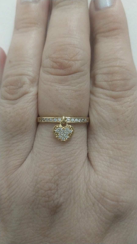 ANEL APARADOR CRAVEJADO COM PINGENTE CORAÇÃO FOLHEADO OURO