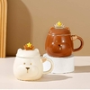 Taza oso corona con tapa y cuchara.