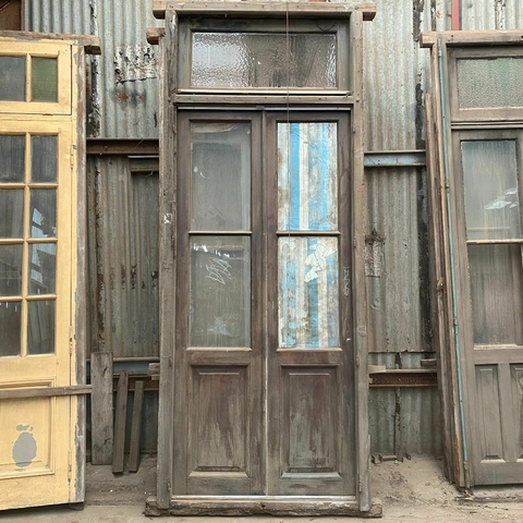 Puerta doble con vidrio y banderola - 148