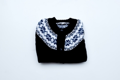 Cardigan de lana azul marino con guarda blanca en internet