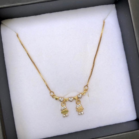 colar-canga-tres-coraçoes-e-dois-meninos-cravejados-com-zirconias-folheado-em-ouro-18k