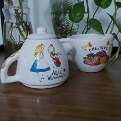 Tetera Con Taza Alicia en internet