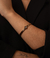 Bracelete fino com pedra em ponto de luz banhado a ouro18K - comprar online