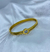 Bracelete fino com pedra em ponto de luz banhado a ouro18K na internet