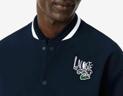Imagen de ROMPEVIENTO IMPERMEABLE ESTILO UNIVERSITARIO LACOSTE - SH 2925 - HHW