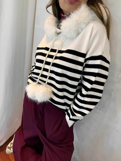 SWETERS RAYAS CUELLO PIEL
