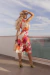 Vestido Midi com estampa floral multicolor com predominância do rosa pink na internet