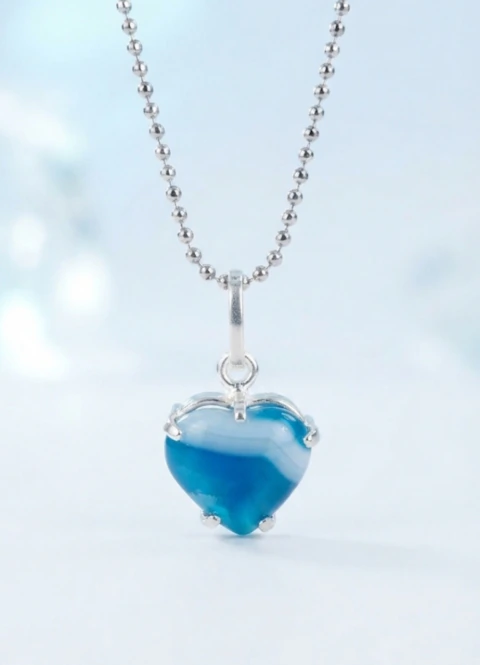 DIJE CORAZON CON BAÑO DE PLATA