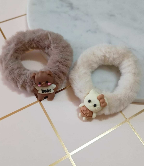 Colita de Peluche y Personaje