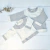 Buzo Blanco Jaspeado y gris