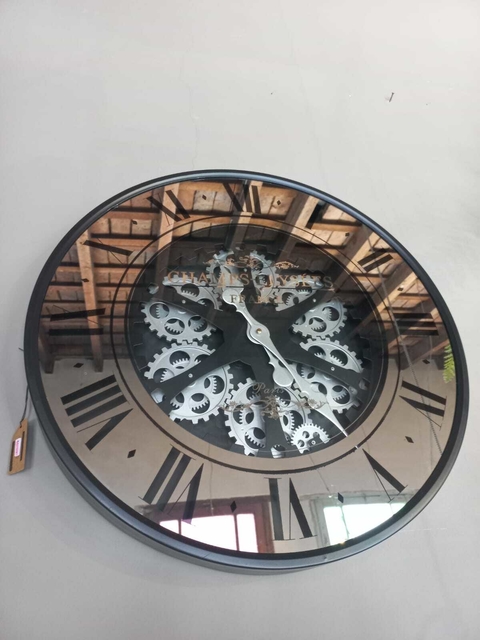 Reloj espejo con engranajes