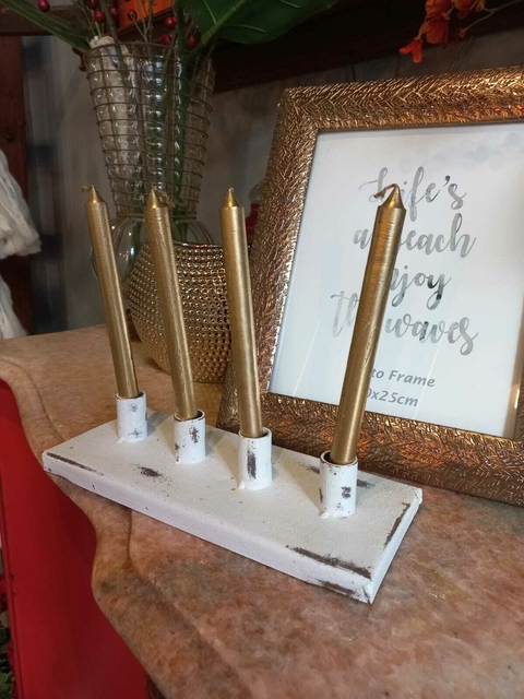 Vela candelera dorada