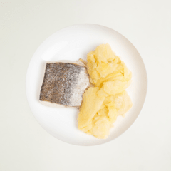 Merluzón confit con aceite de oliva, papas panaderas