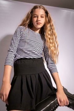 Imagen de Falda Preppy Negra TALLE xs