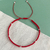 Pulsera Hilo Rojo 5 bolitas
