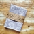 MANTEL ANTIMANCHAS CON TRATAMIENTO IMPERMEABLE GINKGO GRIS