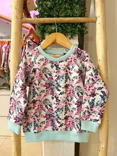 Buzo con frisa ''Estallido floral'' verde aqua