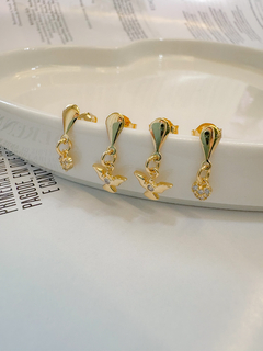 Brinco Duo Espirito Santo e Coração Banhado em Ouro 18k - comprar online