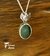 Colgante engarce obsidiana manto huichol en plata